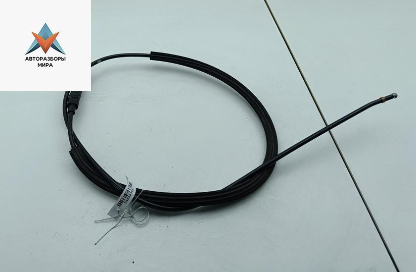 трос капота Volkswagen Caddy 3 поколение 2005, 2.0 л., дизель, МКПП, белый, фургон, 1T0823535D - фото №1