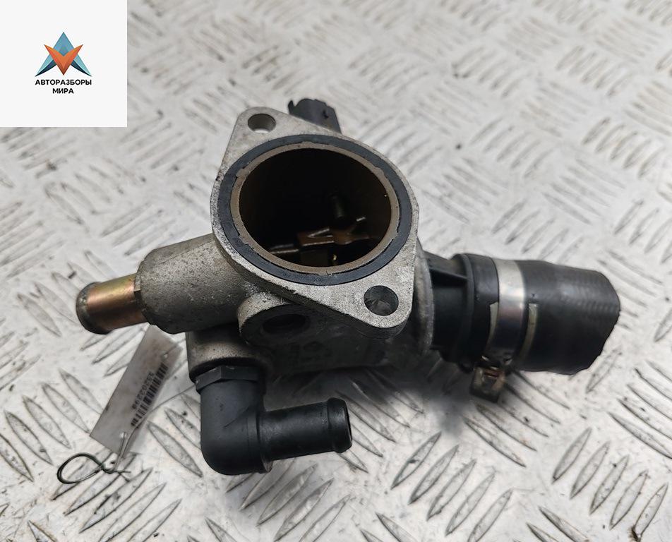 корпус термостата Fiat Stilo 1 поколение 2001, 1.8 л., бензин, МКПП, серый, хетчбэк 3 дв., 60672655 - фото №1