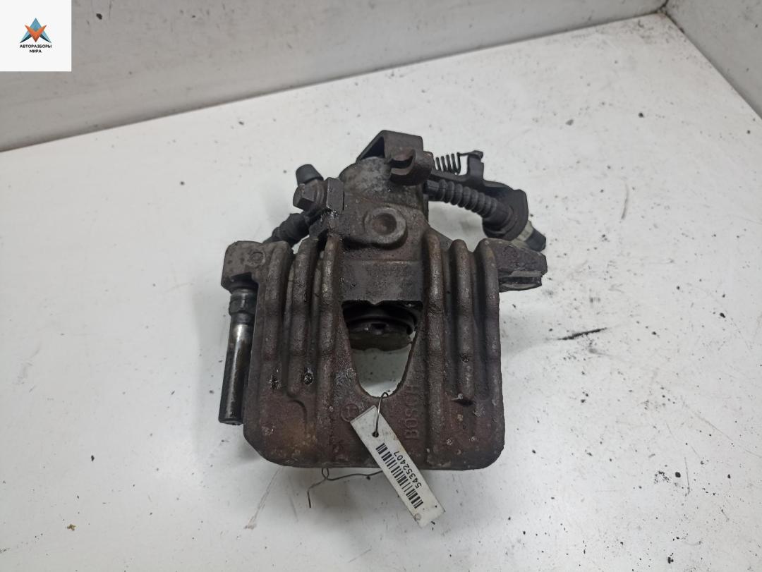 суппорт задний левый Opel Astra G 2000, 1.6 л., бензин, МКПП, чёрный, хетчбэк 5 дв. - фото №1