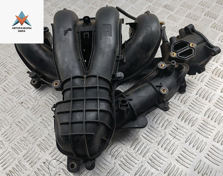 коллектор впускной Ford Mondeo 3 поколение 2002, 1.8 л., бензин, хетчбэк 5 дв., 1S7G9424DF - фото №1