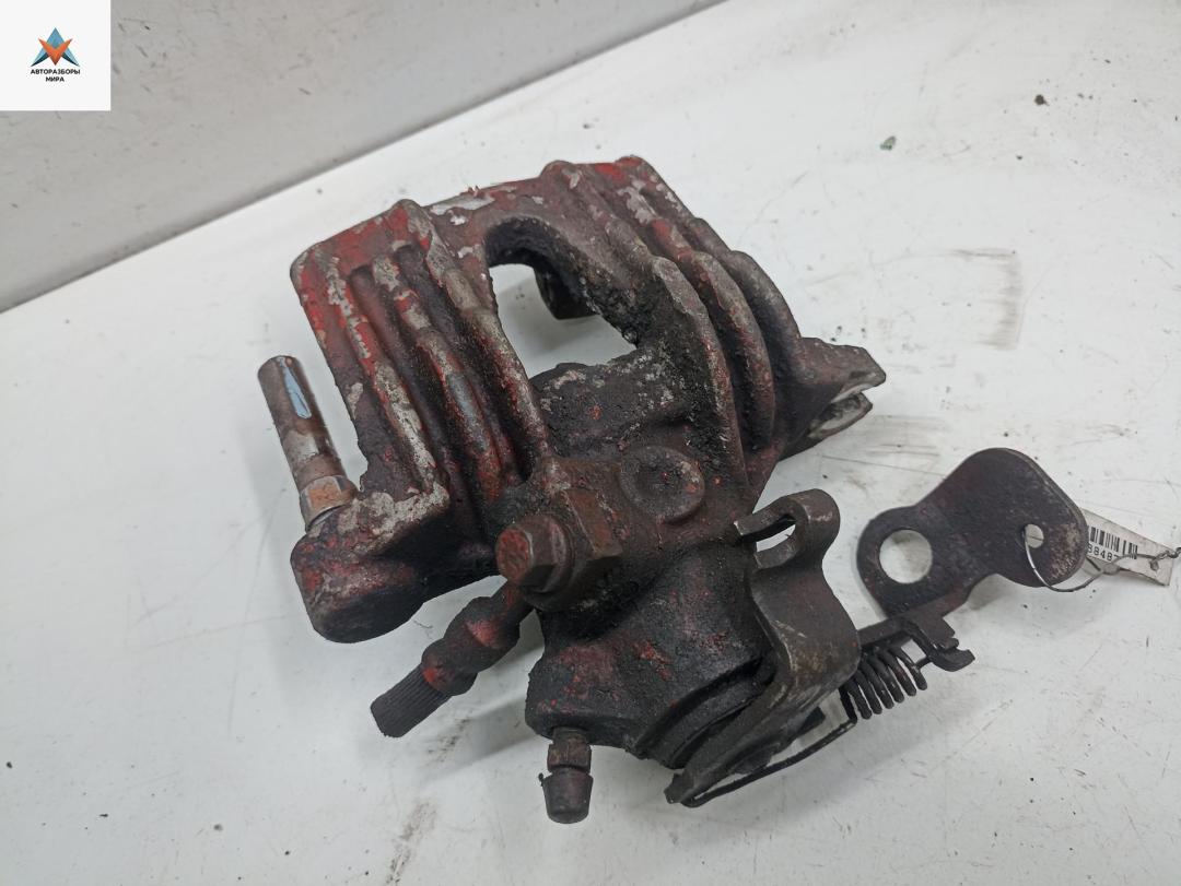 суппорт задний правый Opel Astra G 1999, 2.0 л., дизель, МКПП, чёрный, универсал - фото №1