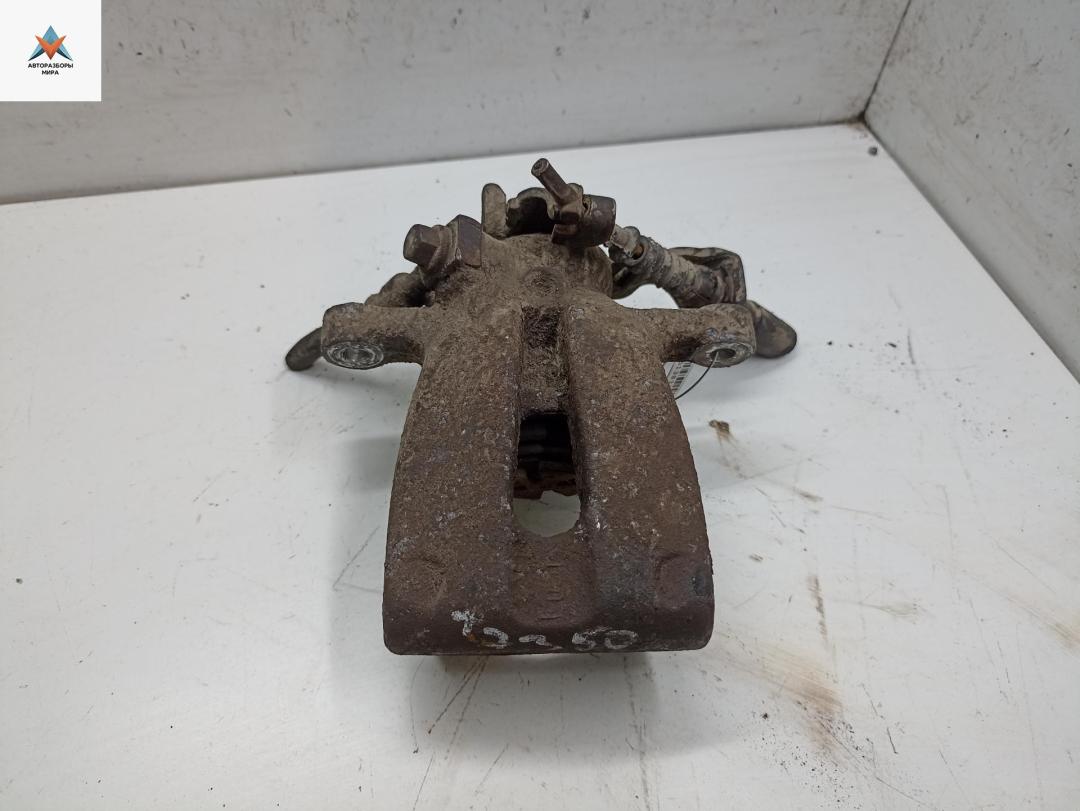 суппорт задний левый Opel Astra G 1999, 1.6 л., бензин, МКПП, зелёный, хетчбэк 5 дв. - фото №1