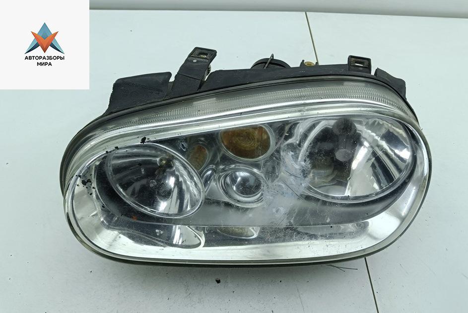 фара левая Volkswagen Golf 4 поколение 2001, 1.6 л., бензин, МКПП, чёрный, хетчбэк 5 дв., 1J1941015B - фото №1