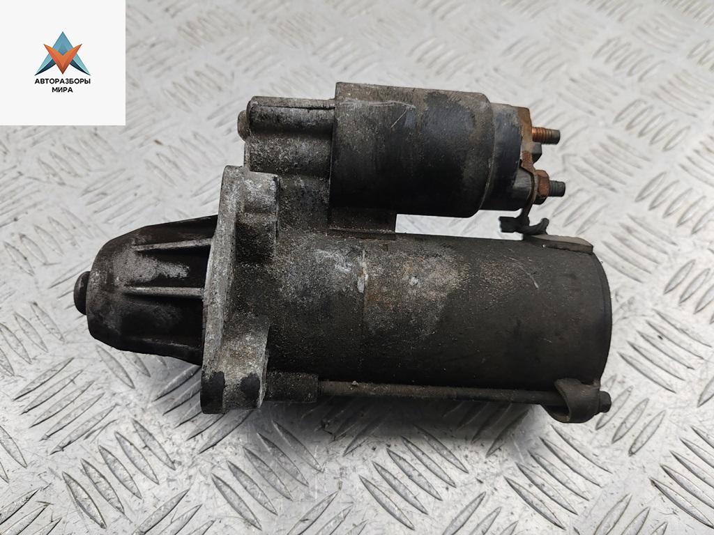 стартер Ford Focus 1 поколение 1998, 1.4 л., бензин, МКПП, зелёный, универсал, 98AB11000BC - фото №1