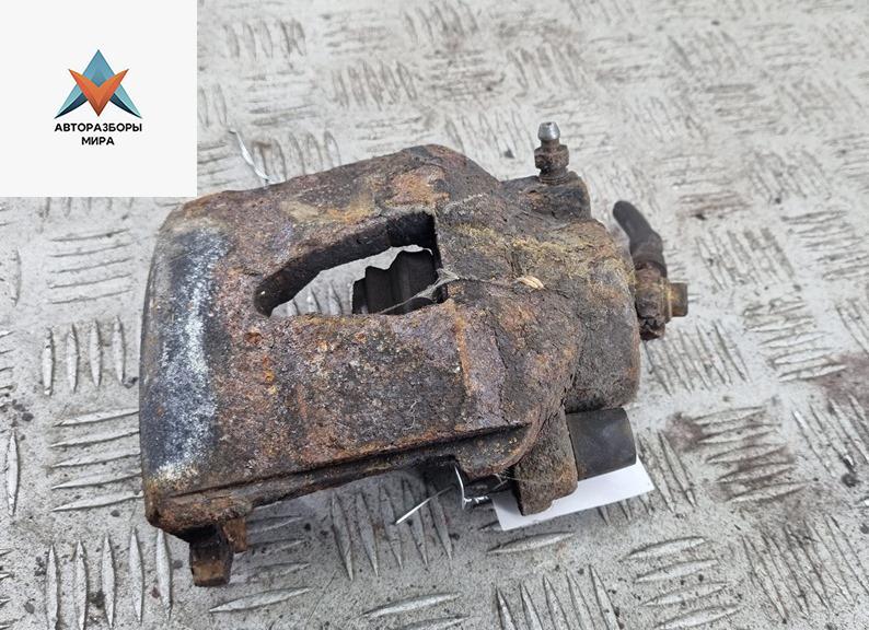 суппорт передний правый SEAT Ibiza 3 поколение 2005, 1.4 л., бензин, МКПП, серый, хетчбэк 3 дв. - фото №1