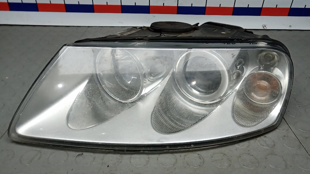 фара левая Volkswagen Touareg 1 поколение 2005, 3.0 л., дизель, АКПП, внедорожник 5 дв. - фото №1