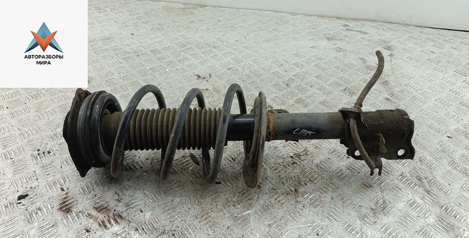 стойка передняя Renault Koleos 1 поколение 2008, 2.5 л., бензин, МКПП, серый, внедорожник 5 дв. - фото №1