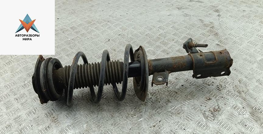 стойка передняя Renault Koleos 1 поколение 2008, 2.5 л., бензин, МКПП, серый, внедорожник 5 дв. - фото №1