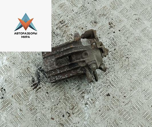 суппорт задний правый Volkswagen Golf 4 поколение 2000, 1.4 л., бензин, МКПП, серый, хетчбэк 5 дв. - фото №1