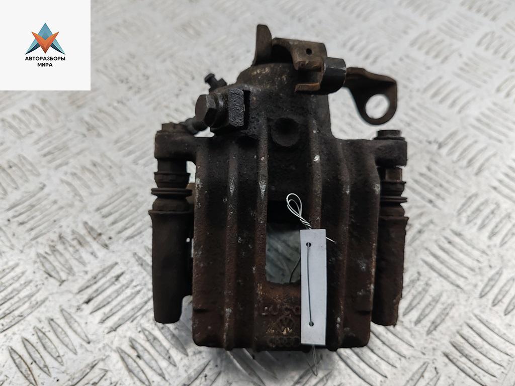 суппорт задний левый Volkswagen Bora 1 поколение 2000, 2.0 л., бензин, МКПП, синий, седан - фото №1