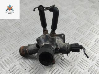 фланец (тройник) системы охлаждения Volkswagen Golf 4 поколение 2000, 1.9 л., дизель, МКПП, серый, хетчбэк 5 дв., 038121133A