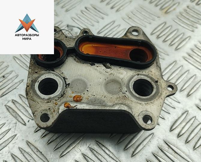 теплообменник масляного фильтра Volkswagen Passat B7 2013, 2.0 л., дизель, МКПП, чёрный, универсал, 03L117021C - фото №1