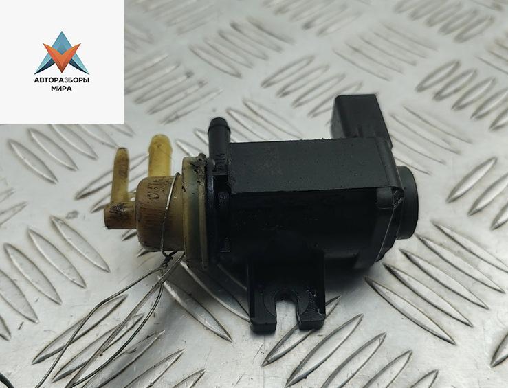 клапан управления турбиной (актуатор) Volkswagen Passat B7 2013, 2.0 л., дизель, МКПП, чёрный, универсал, 1K0906627B - фото №1