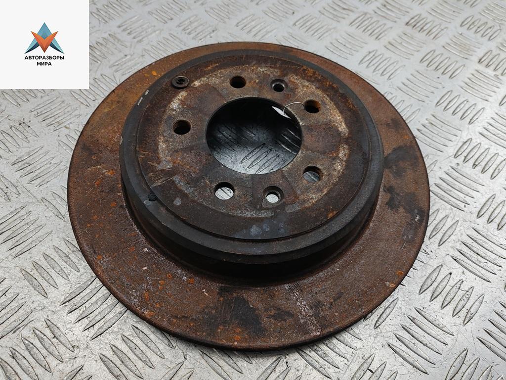 диск тормозной задний Peugeot 607 1 поколение 2000, 2.2 л., бензин, МКПП, серый, седан - фото №1