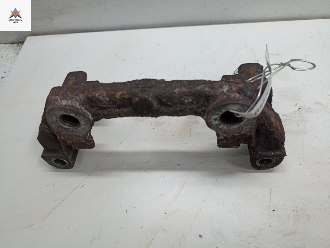 скоба суппорта Opel Vectra C 2002, 1.8 л., бензин, МКПП, серый, седан - фото №1