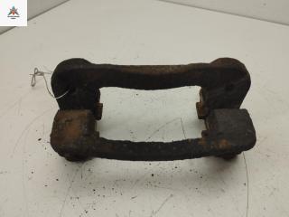 скоба суппорта Kia Rio 2 поколение 2005, 1.6 л., бензин, МКПП, серый, хетчбэк 5 дв.