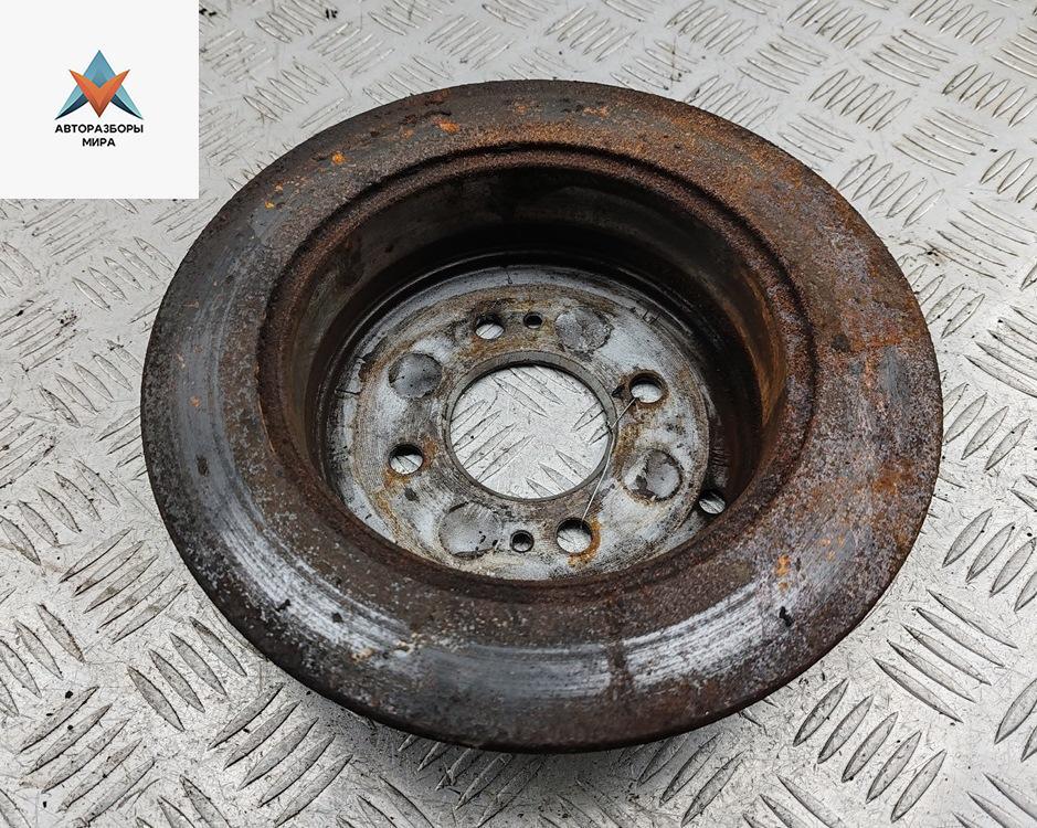 диск тормозной задний Kia Rio 2 поколение 2005, 1.6 л., бензин, МКПП, серый, хетчбэк 5 дв. - фото №1