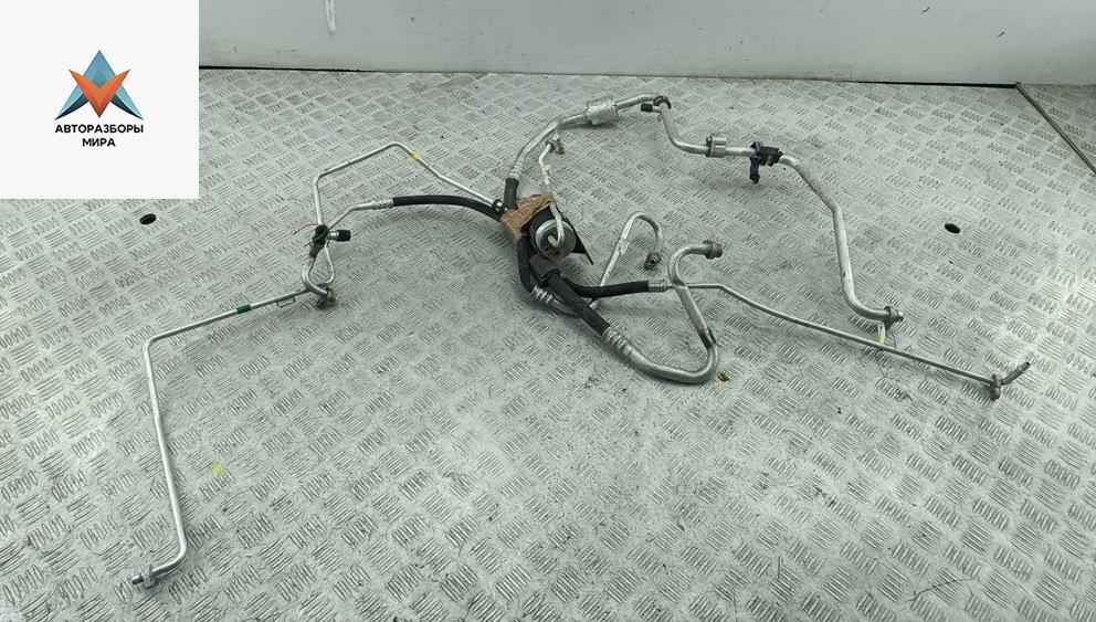 трубка кондиционера Dacia (Renault) Logan 2007, 1.5 л., дизель, МКПП, серый, универсал, 8200670814, 8200663649, 8200670812 - фото №1