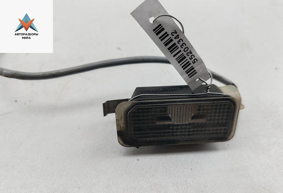 подсветка номера Ford Fiesta 6 поколение 2009, 1.3 л., бензин, МКПП, красный, хетчбэк 3 дв., 6M2A13550AC - фото №1