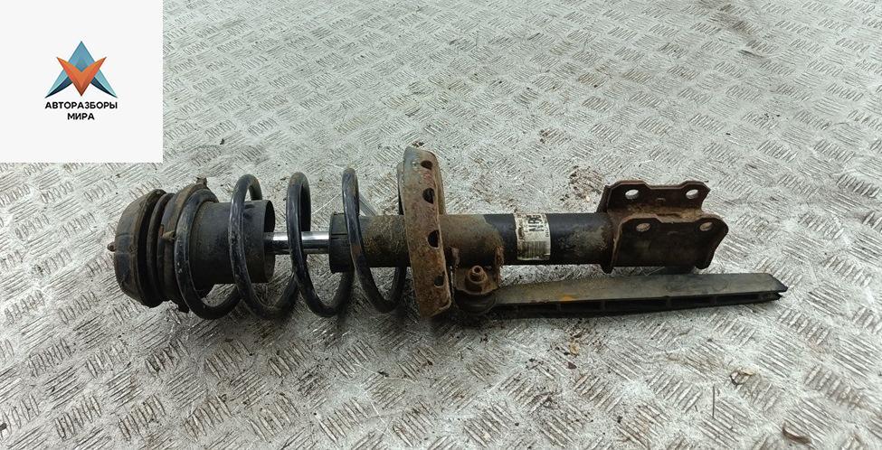 стойка передняя Opel Astra G 2002, 1.6 л., бензин, МКПП, серый, универсал - фото №1