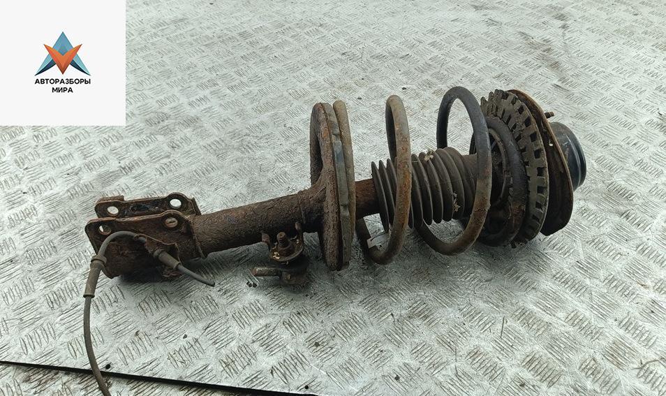 стойка передняя Chrysler Voyager 4 поколение 2001, 2.4 л., бензин, МКПП, серый, минивэн - фото №1