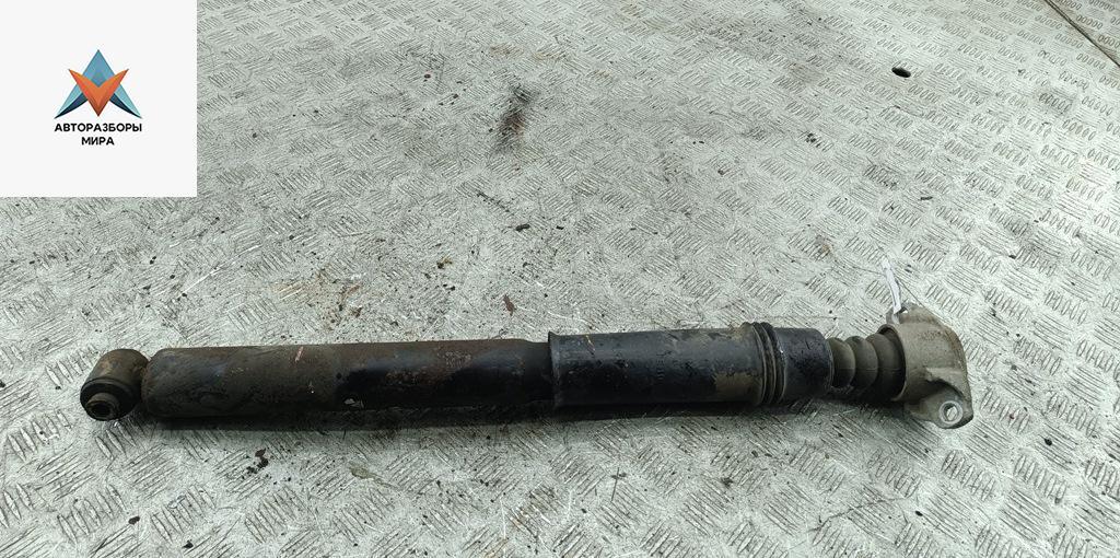 амортизатор задний левый Peugeot 307 1 поколение 2002, 1.6 л., бензин, МКПП, серый, хетчбэк 3 дв. - фото №1