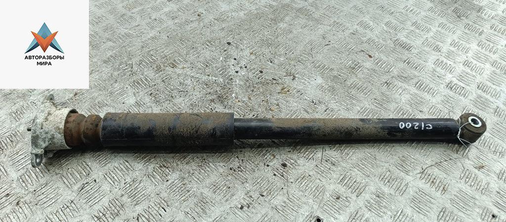 амортизатор задний левый Ford Fiesta 6 поколение 2009, 1.3 л., бензин, МКПП, красный, хетчбэк 3 дв. - фото №1