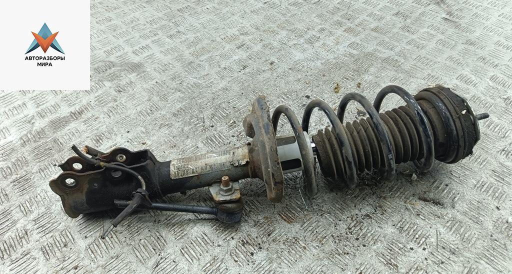 стойка передняя Ford Fiesta 6 поколение 2009, 1.3 л., бензин, МКПП, красный, хетчбэк 3 дв. - фото №1