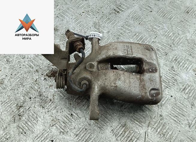 суппорт задний левый Volkswagen Golf 5 поколение 2007, 1.4 л., бензин, МКПП, зелёный, универсал - фото №1