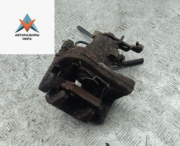 суппорт задний левый Volkswagen Golf 5 поколение 2007, 1.4 л., бензин, МКПП, серый, хетчбэк 3 дв. - фото №1