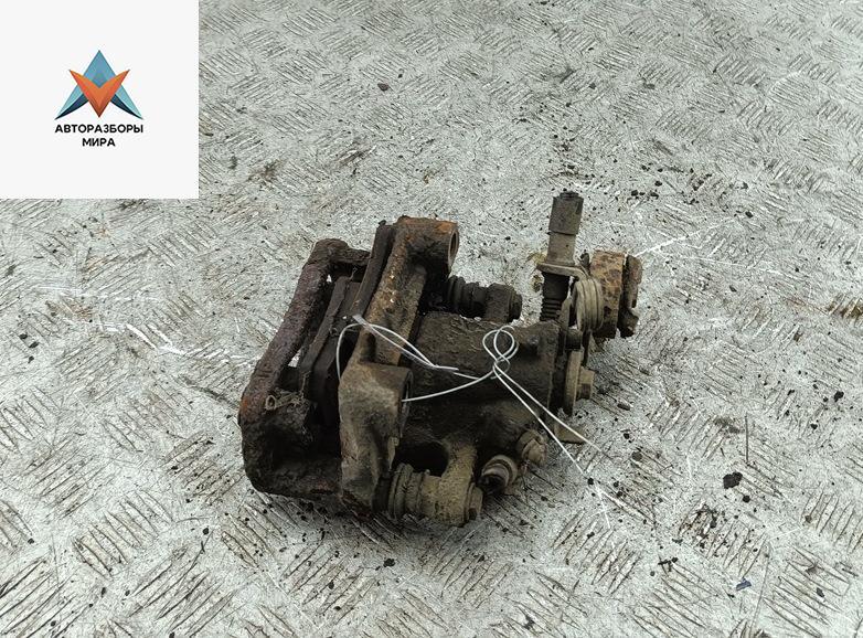 суппорт задний левый Opel Astra G 1999, 1.6 л., бензин, МКПП, чёрный, универсал - фото №1