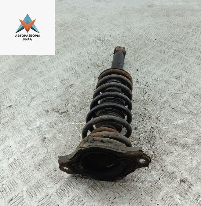 стойка передняя Nissan Primera P11 2000, 1.8 л., бензин, МКПП, серый, универсал - фото №1