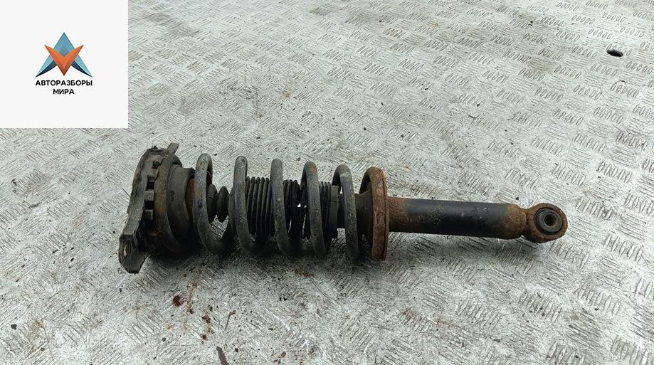 стойка передняя Nissan Primera P11 2000, 1.8 л., бензин, МКПП, серый, универсал - фото №1