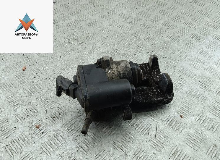 суппорт задний левый Volkswagen Passat B6 2007, 2.0 л., дизель, МКПП, коричневый, универсал - фото №1