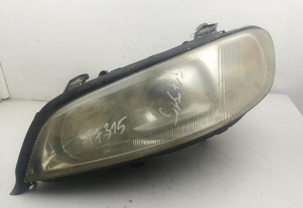 фара левая Opel Omega B 2001, 2.2 л., бензин, МКПП, серый, универсал, 24406226
