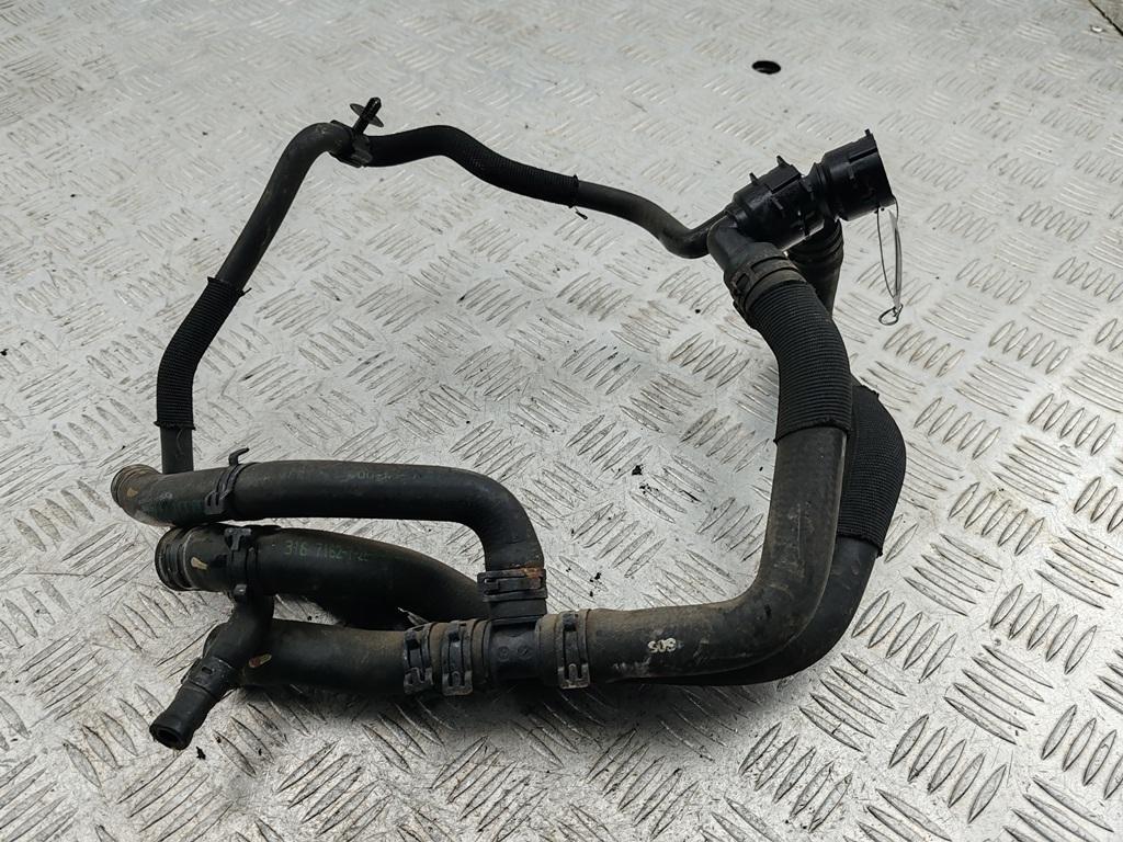 патрубок отопителя (печки) Volkswagen Passat B6 2007, 1.6 л., бензин