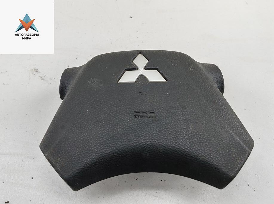 подушка безопасности водителя Mitsubishi Grandis 1 поколение 2009, 2.4 л., бензин, АКПП, серый, минивэн, MN103444 - фото №1