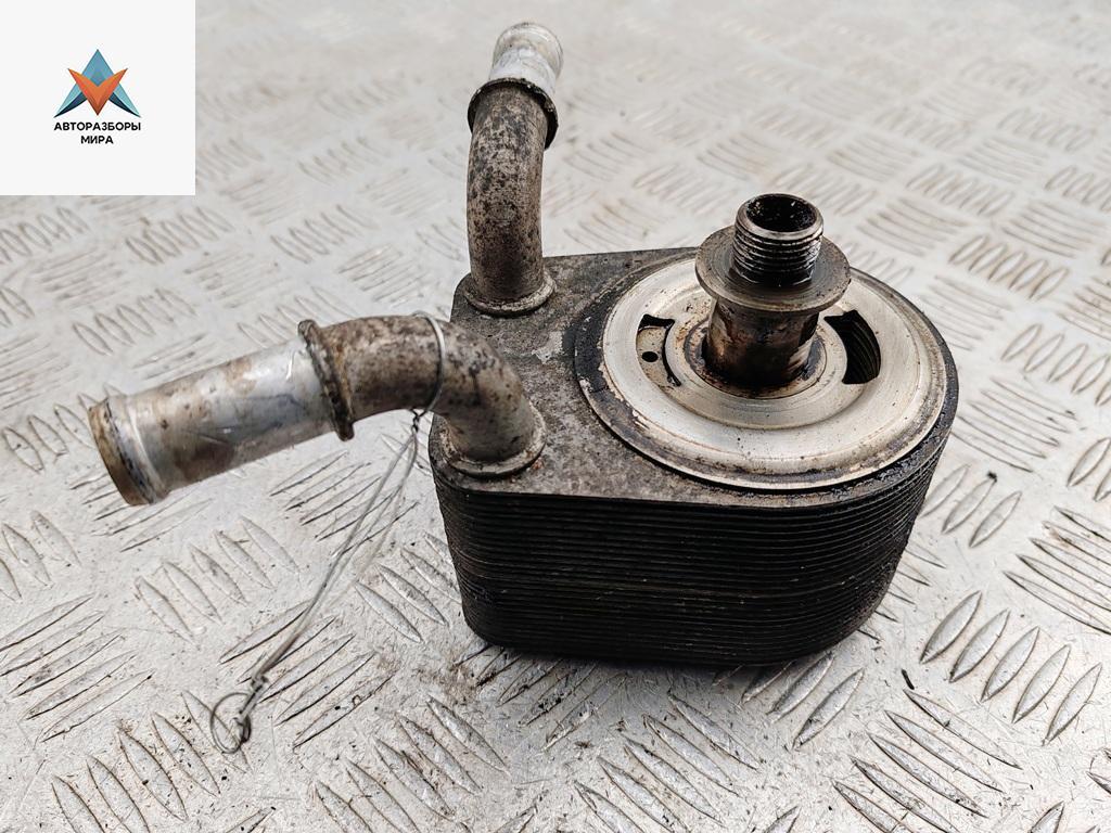 теплообменник масляного фильтра Ford Focus 2 поколение 2005, 1.6 л., i, бензин, МКПП, чёрный, хетчбэк 5 дв., 4M5G6B856BC - фото №1