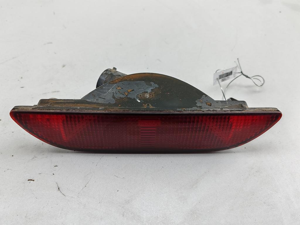 фонарь противотуманный центральный Nissan Note 2009, 1.4 л., бензин, МКПП, серый, минивэн, 2658091101