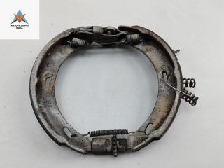 Механизм развода задних тормозных колодок правый Mercedes-Benz C-Класс W201 [рестайлинг] 1989, 2.0 л., бензин, МКПП, красный, седан