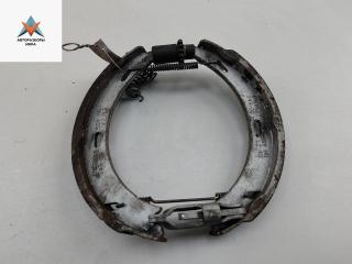 Механизм развода задних тормозных колодок левый Mercedes-Benz C-Класс W201 [рестайлинг] 1989, 2.0 л., бензин, МКПП, красный, седан