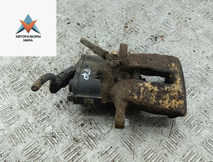 суппорт задний левый Volkswagen Passat B6 2009, 1.4 л., бензин, МКПП, чёрный, универсал - фото №1