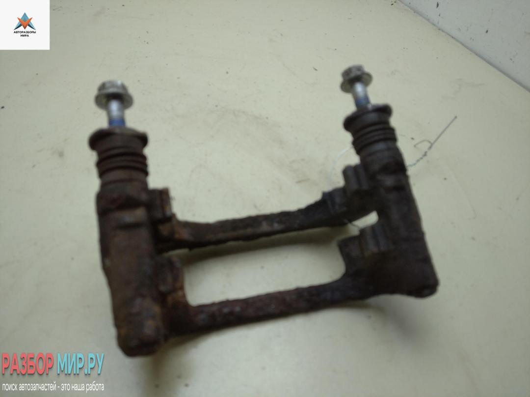 скоба суппорта Fiat Stilo 1 поколение 2002, 1.6 л., бензин, МКПП, синий, хетчбэк 5 дв. - фото №1