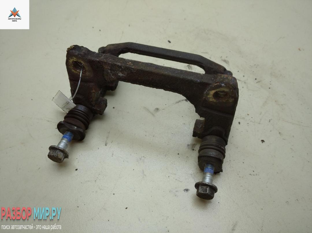 скоба суппорта Fiat Stilo 1 поколение 2002, 1.6 л., бензин, МКПП, синий, хетчбэк 5 дв. - фото №1