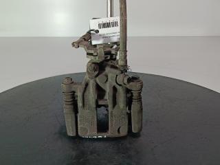 суппорт задний левый Nissan Almera N16 [рестайлинг] 2003, цвет