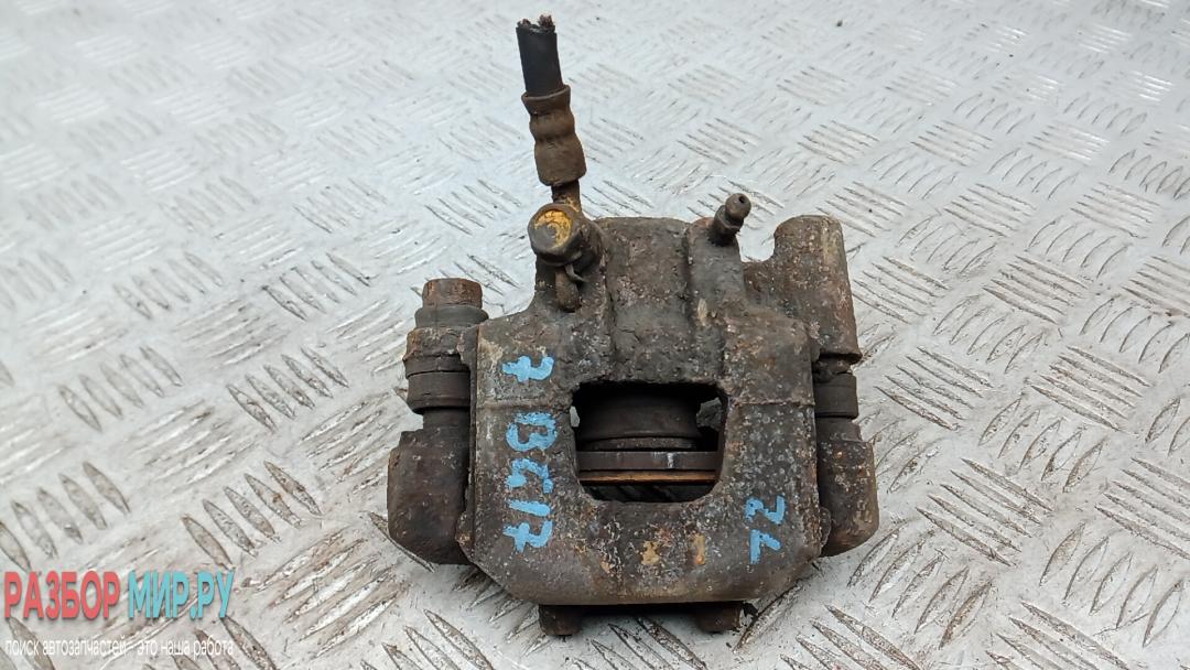 суппорт задний левый Toyota Prius 2 поколение 2005, 1.5 л., бензин, АКПП, хетчбэк 5 дв., 4775021030 - фото №1