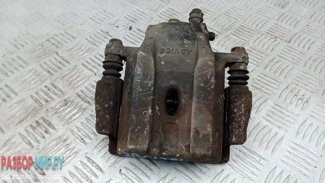 суппорт передний левый Toyota Prius 2 поколение 2005, 1.5 л., бензин, АКПП, хетчбэк 5 дв., 4775047020 - фото №1