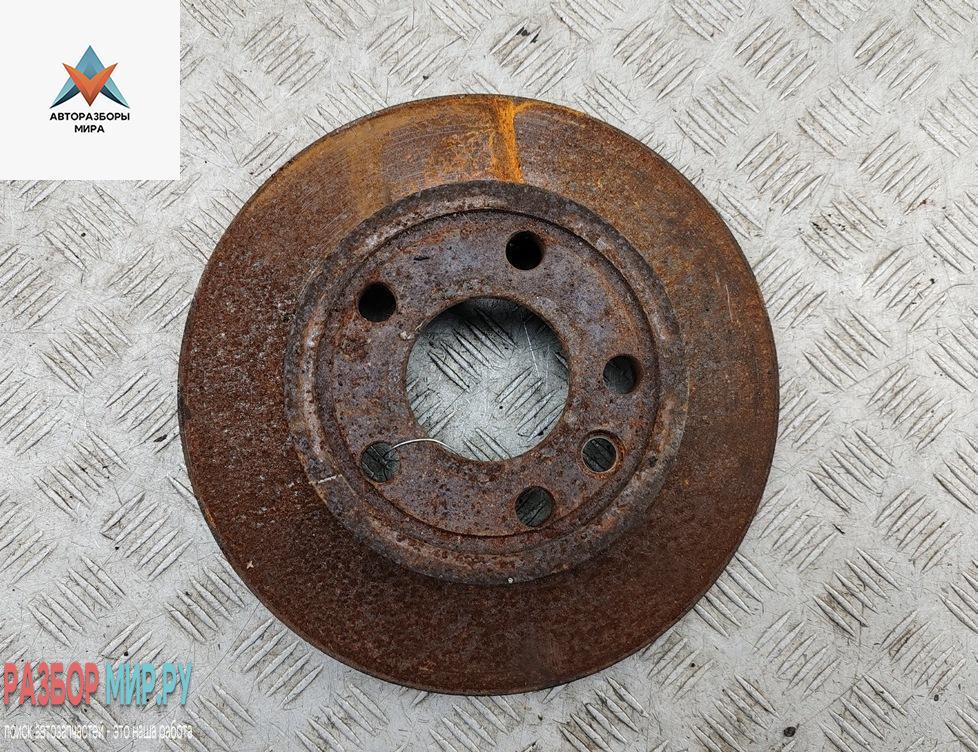 диск тормозной передний Volkswagen Transporter T4 1995, 2.4 л., дизель, МКПП, серый, микроавтобус - фото №1