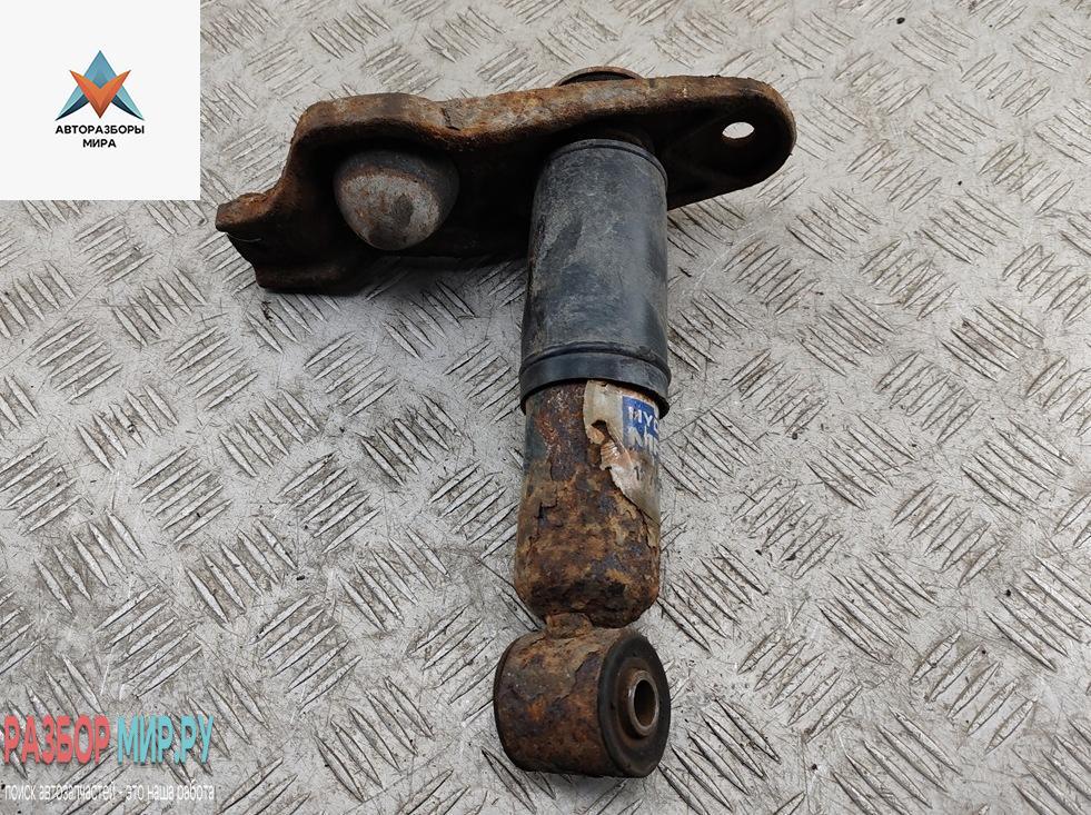 амортизатор передний левый Volkswagen Transporter T4 1995, 2.4 л., дизель, МКПП, серый, микроавтобус - фото №1