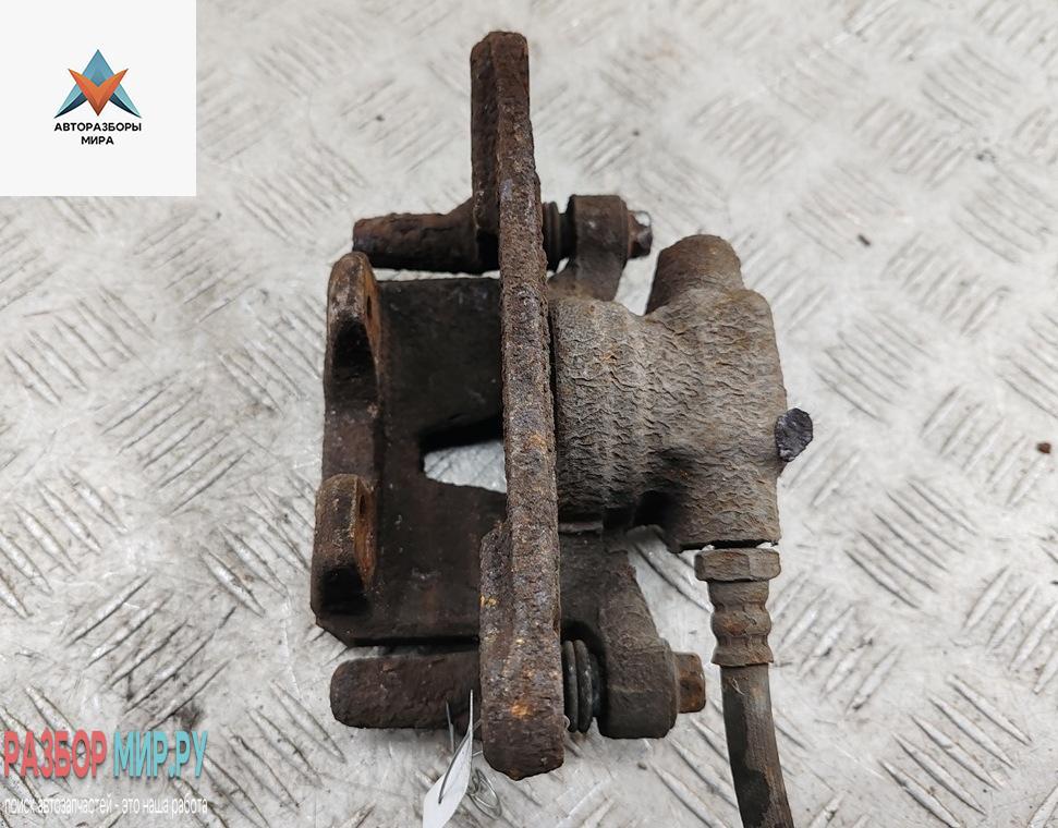 суппорт задний левый Mitsubishi Grandis 1 поколение 2009, 2.4 л., бензин, АКПП, серый, минивэн - фото №1